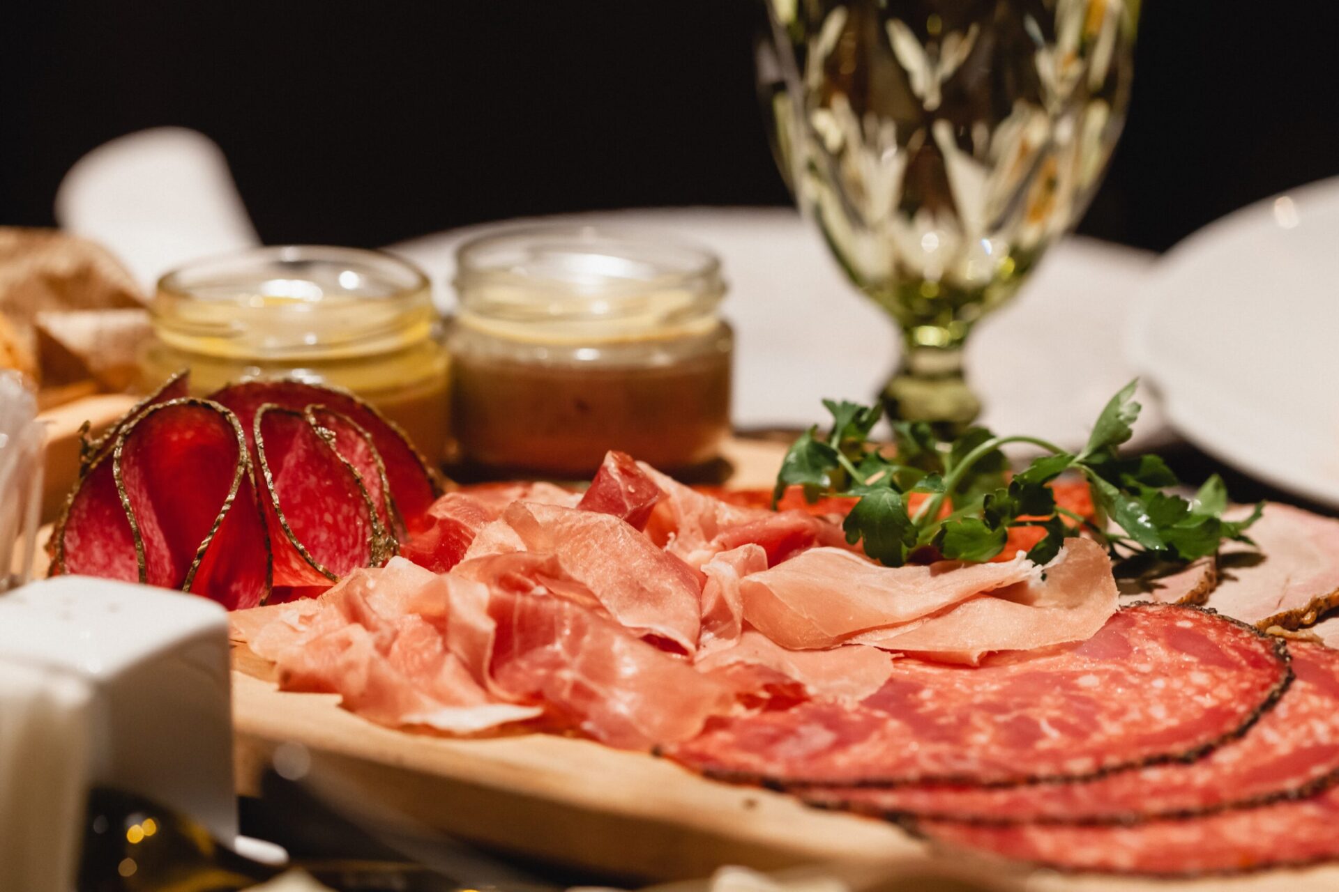What is charcuterie and how should you serve it?